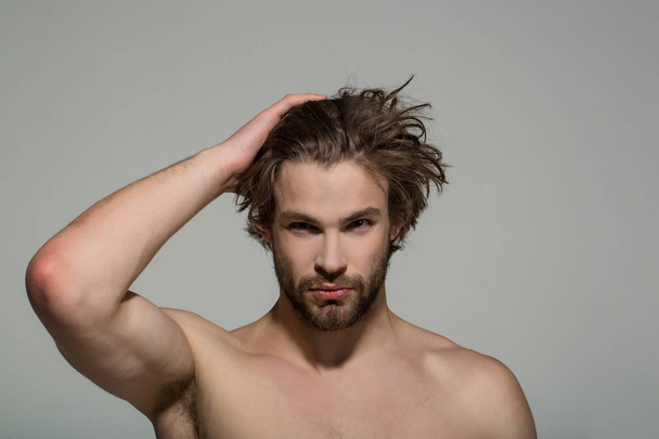 handsome man with beard and stylish hair, morning and fashion - Zdjęcie, obraz