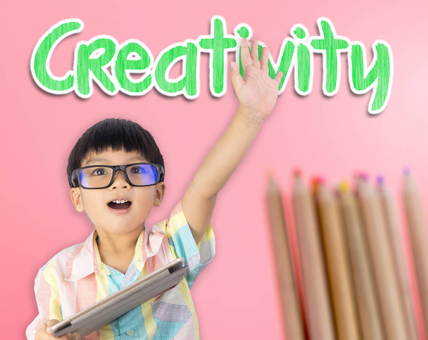 Nerdy kid raised his hand for Creativity concept - Фото, изображение