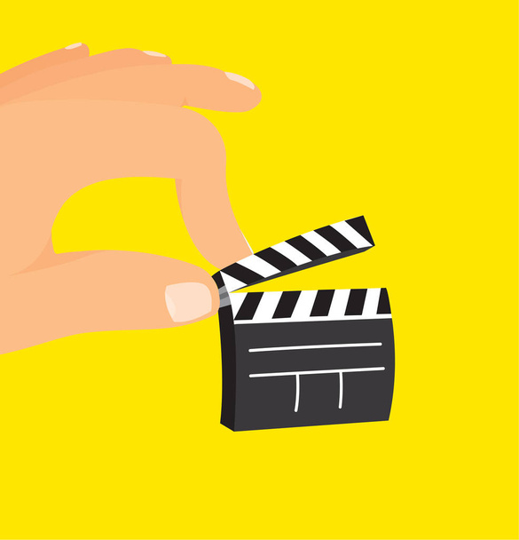 Hand holding a tiny clapperboard - Vector, imagen