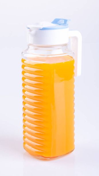 Orange juice or Orange juice in jug on background - Photo, Image