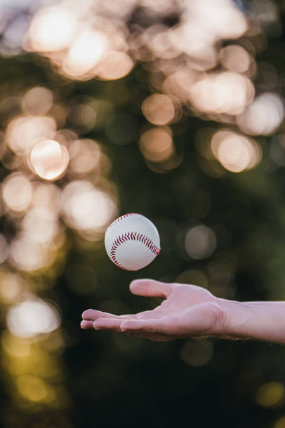 Baseball ball in air - Foto, afbeelding