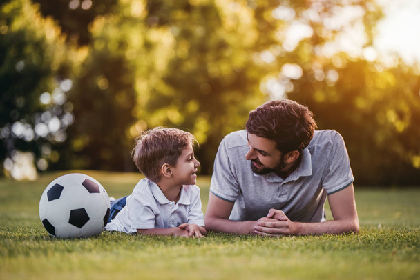 Dad with son playing football - Foto, imagen