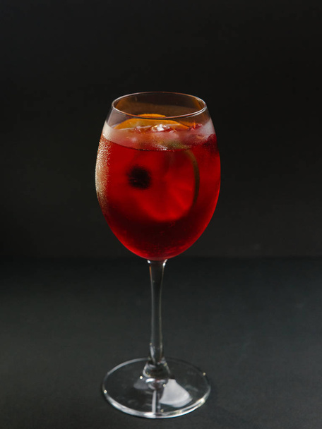 Raspberry and vodka cocktail with lime and lemon  - Фото, изображение