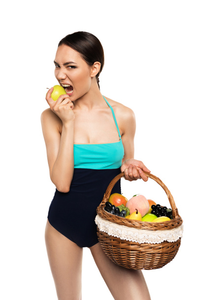 Frau im Badeanzug mit Früchten - Foto, Bild