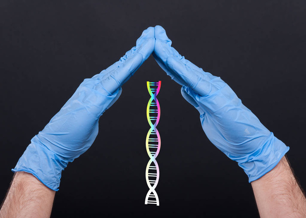 Kézi betöltő DNS molekula fogalmát orvos - Fotó, kép