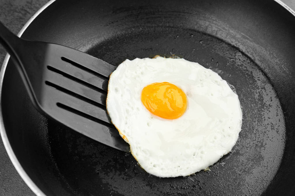 Homemade fried egg  - Фото, изображение
