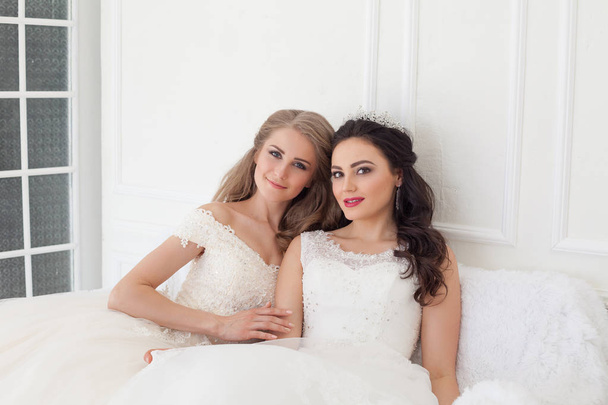 two brides on wedding wedding blonde brunette girlfriend - Foto, imagen