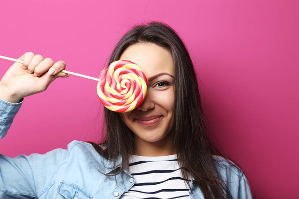 Young woman with lollipop - Fotografie, Obrázek