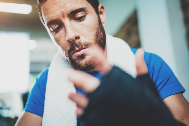Athlete tying boxing bandages - 写真・画像