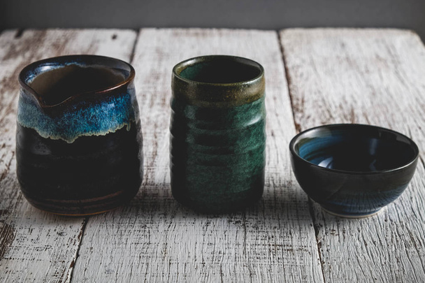 Ceramic cup molded from clay and burned with heat with filter effect retro vintage style - Foto, Imagem