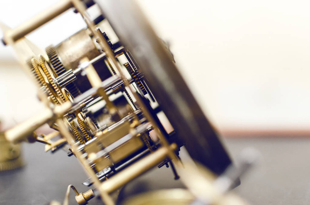 Old golden broken watch mechanism - Фото, изображение
