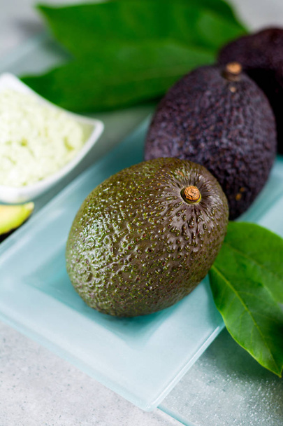 Avocado skin & hair care home spa, ripe avocados and bowl with h - Photo, Image