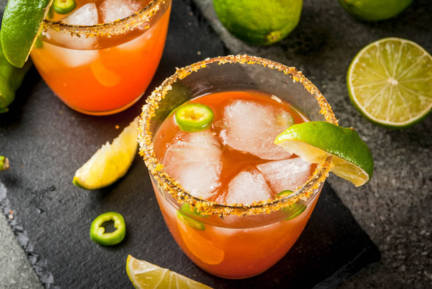 Traditional Mexican cocktail Spicy michelada - Photo, Image