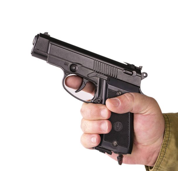 Main avec pistolet isolé sur blanc
 - Photo, image