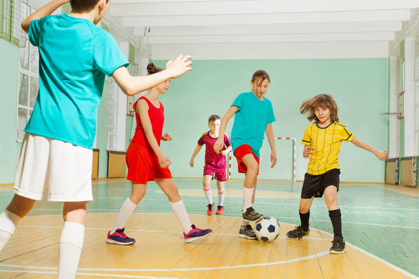boys and girls training football - Foto, Imagen
