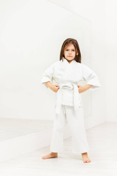 girl in kimono training karate - Foto, afbeelding