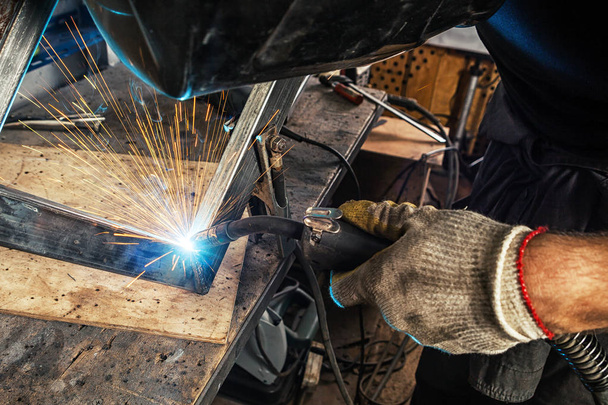 man weld a metal welding machine - Photo, Image