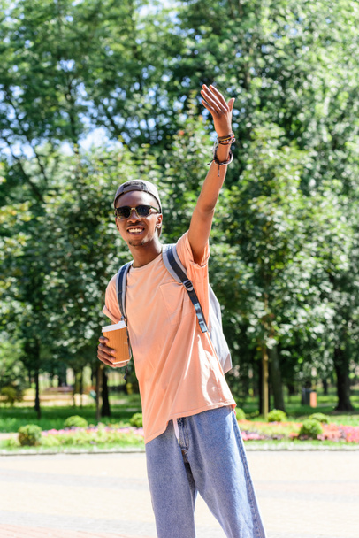 african american man with coffee to go - 写真・画像