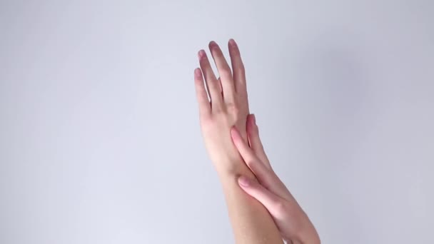 girl's hands on a white background - Video, Çekim