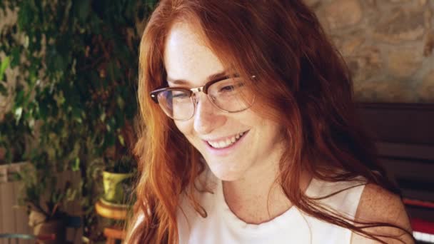 Young redhead girl in glasses - Footage, Video