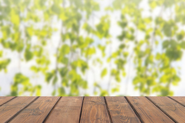 Wood table top on abstract blur background - Foto, imagen