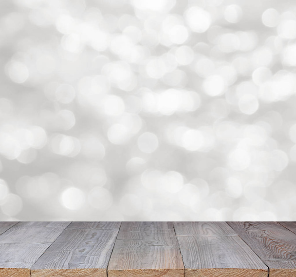Wood table top on shiny white bokeh abstract background - Photo, Image