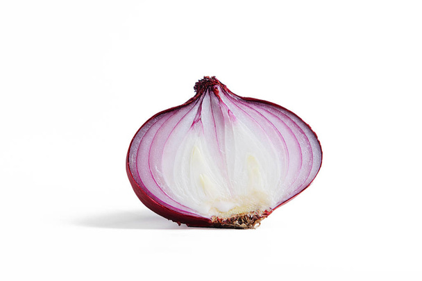 Fresh red onion cutted in half - Фото, изображение