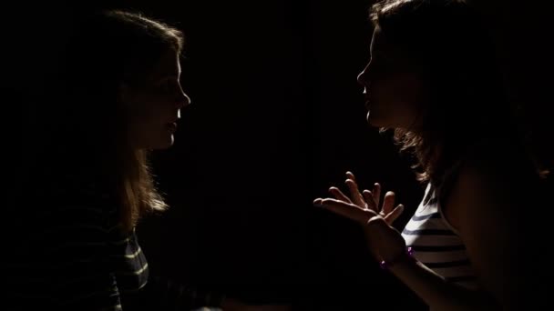 Two girls angry with each other. Anger, quarrel, violence. Unhappy mother and daughter or two sisters, family issues. - Video