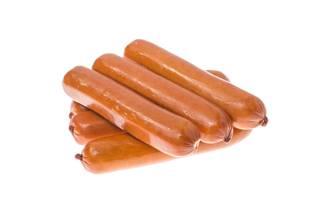 Small smoked sausages on white background. - Photo, Image