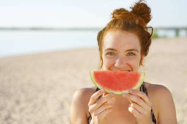 Fun young woman with watermelon smile - Fotoğraf, Görsel