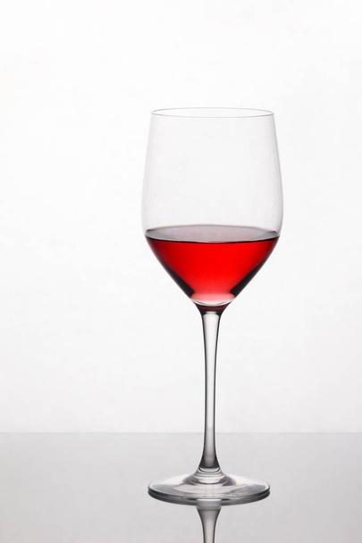 Glass of red wine with reflection - Photo, image