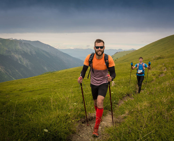 Man trail running in the mountain in Altai, Russia - Photo, Image