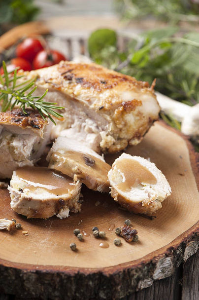 Chicken stuffed on a rustic table - Photo, Image