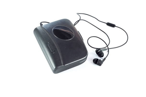 Reproductor de casetes y auriculares negros aislados
 - Foto, Imagen