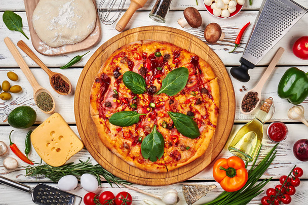 Appetizing pizza decoration, top view. - Photo, Image