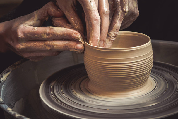 Master class on modeling of clay on a potters wheel - Photo, Image
