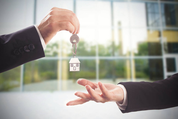 Handling house key. Key, Moving House, Real Estate concept - Photo, Image