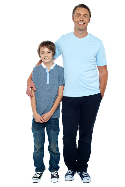 Casual studio shot of father and son - Foto, imagen