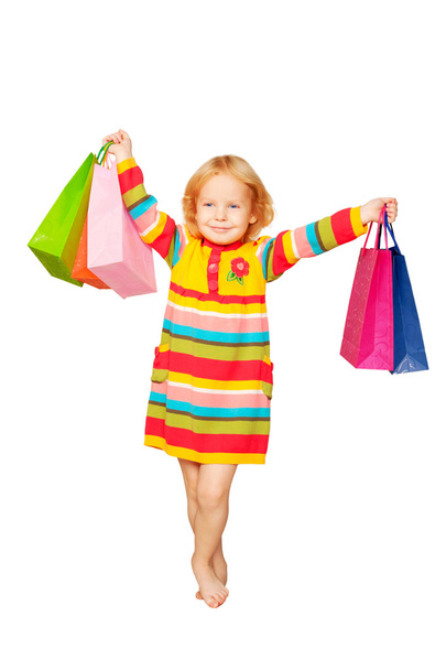 Moda bambina bionda con borse della spesa
 - Foto, immagini