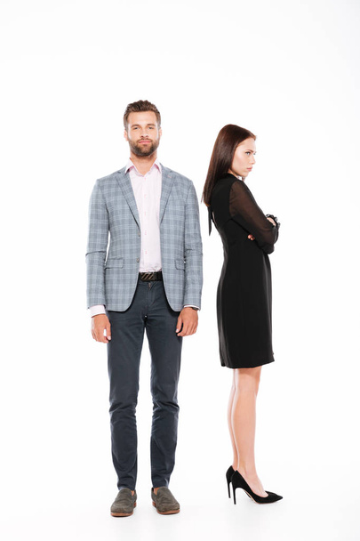 Offence young loving couple standing isolated - Foto, imagen