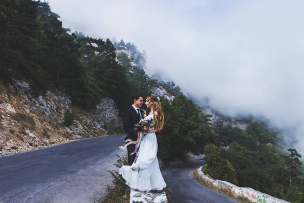 wedding couple walking in mountains - Photo, Image