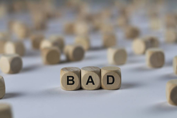 bad   cube with letters, sign with wooden cubes - Photo, Image