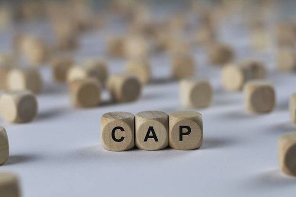 cap   cube with letters, sign with wooden cubes - Photo, Image