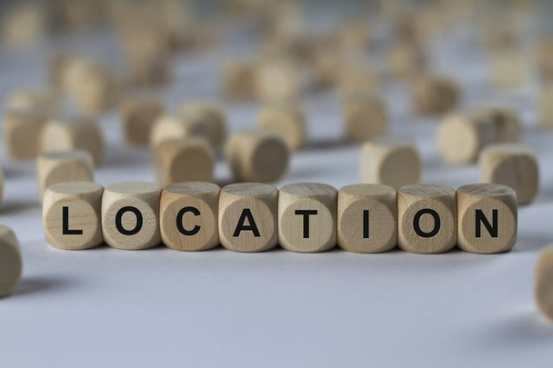 location   cube with letters, sign with wooden cubes - Foto, Imagem