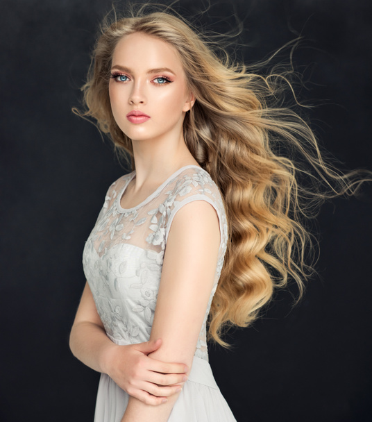 Blonde fashion  girl with curly hair  - 写真・画像