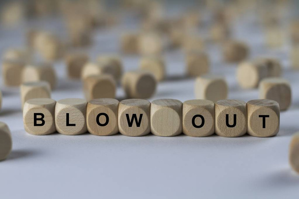 blow out   cube with letters, sign with wooden cubes - Photo, Image