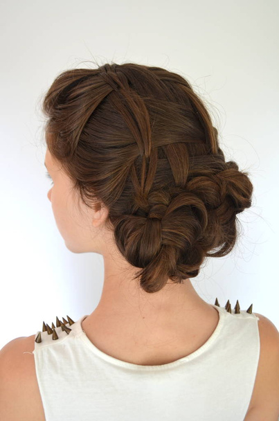 Hairstyle braiding on medium length - Foto, Imagen