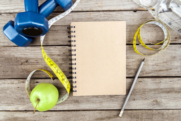 Notebook, jabłko i sport sprzęt - Zdjęcie, obraz