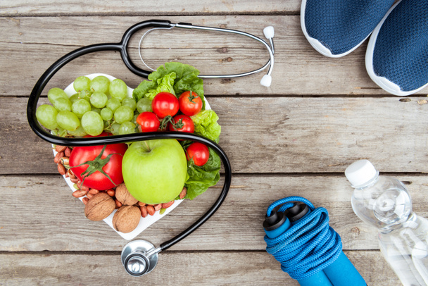 stethoscope, organic food and sport equipment - Photo, Image