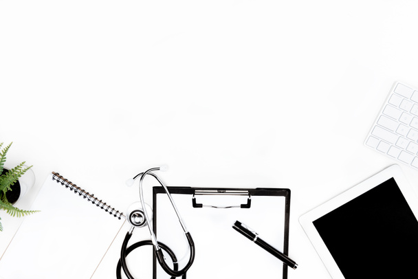 stethoscope, clipboard and digital devices - Fotoğraf, Görsel